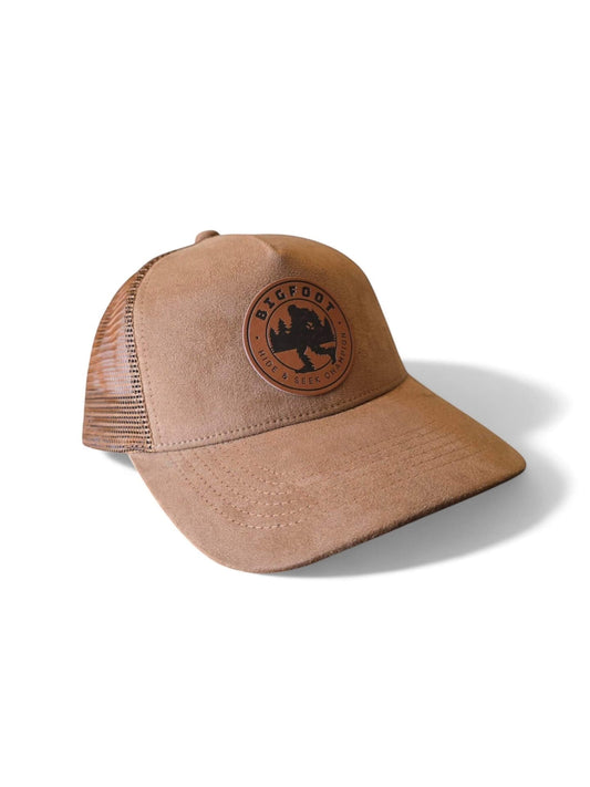 Moove Headwear tan suede 5-panel trucker hat with Bigfoot leather patch and mesh back