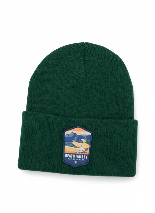 Moove Headwear dark green knit beanie with a Death Valley National Park patch. Comfortable and warm for hiking.