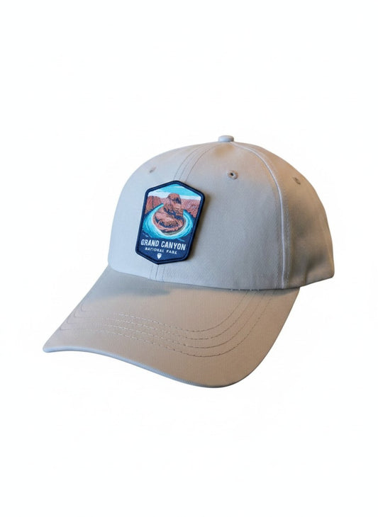 Moove Headwear tan baseball cap with Grand Canyon National Park embroidered patch. Adjustable strap.