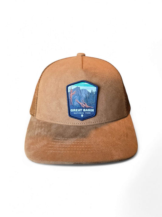 Moove Headwear tan suede trucker hat with mesh back and Great Basin National Park patch.