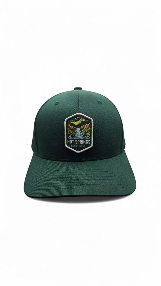 Moove Headwear dark green fitted baseball cap with embroidered Hot Springs National Park patch.
