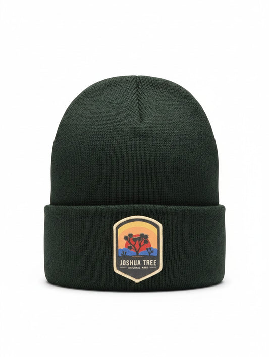 Moove Headwear dark green knit beanie featuring a Joshua Tree National Park patch with a desert sunset design.