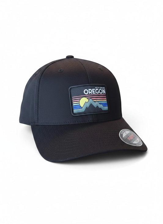 Moove Headwear black baseball cap with a colorful Oregon landscape patch and Flexfit technology.