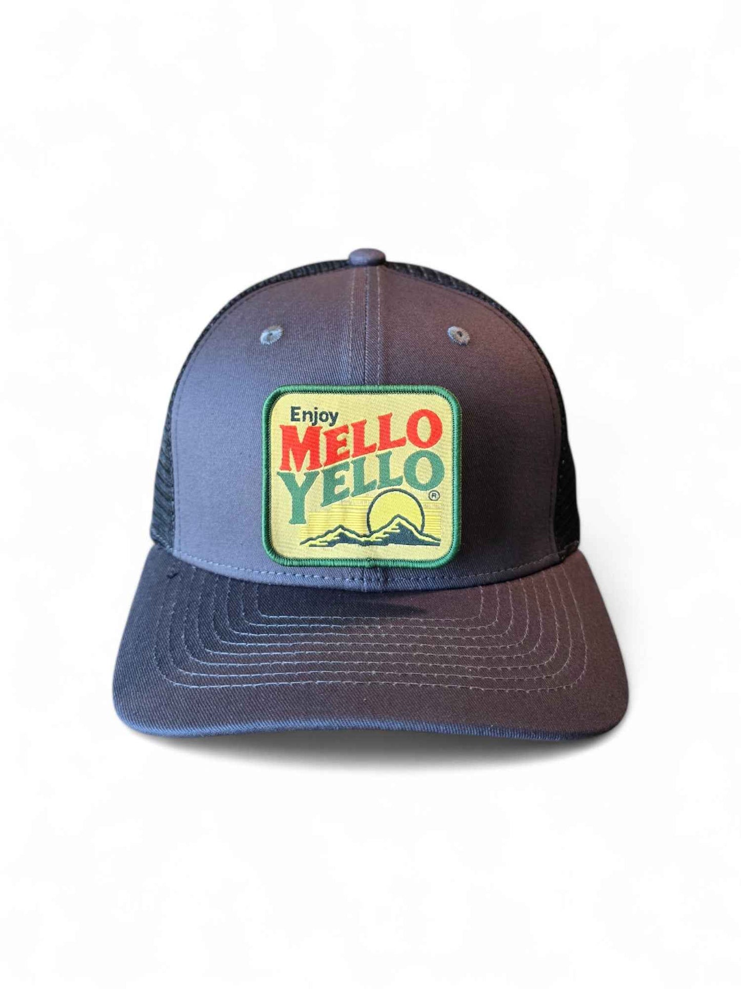 Gray and black retro trucker hat with Mello Yello patch, mesh back, and snapback closure