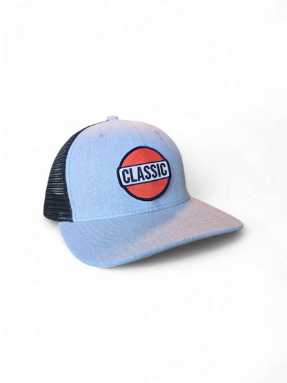 Heather gray and black retro trucker hat featuring Classic patch with red, white, and blue design