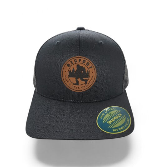 Sasquatch Trucker Hat – Hide and Seek Leather Patch Cap - Black on Black Mesh image