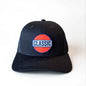 All black retro trucker hat with bold red, white, and blue Classic patch