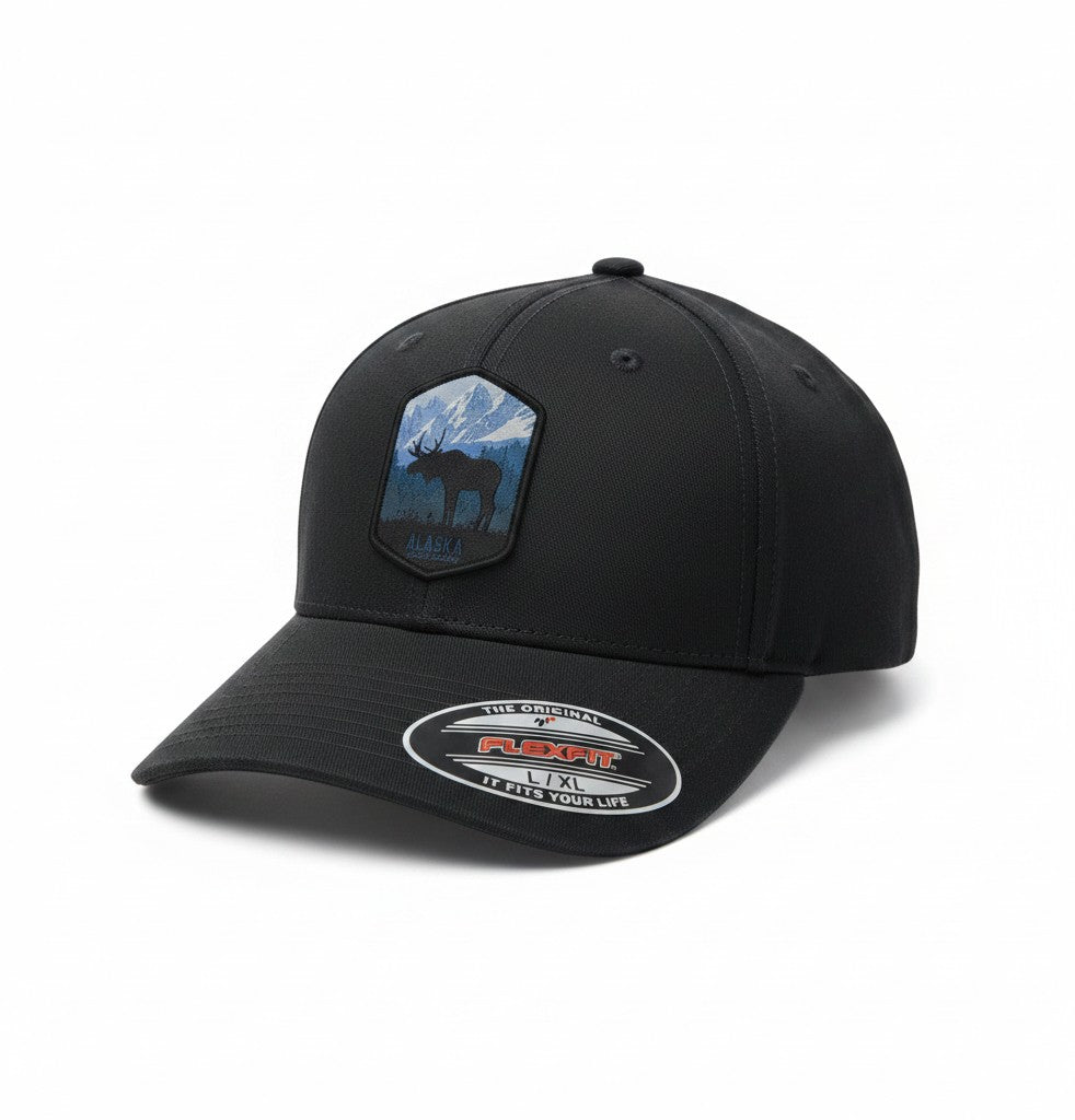 Moove Headwear Alaska fitted hat with embroidered moose and mountain patch. Dark gray fabric.