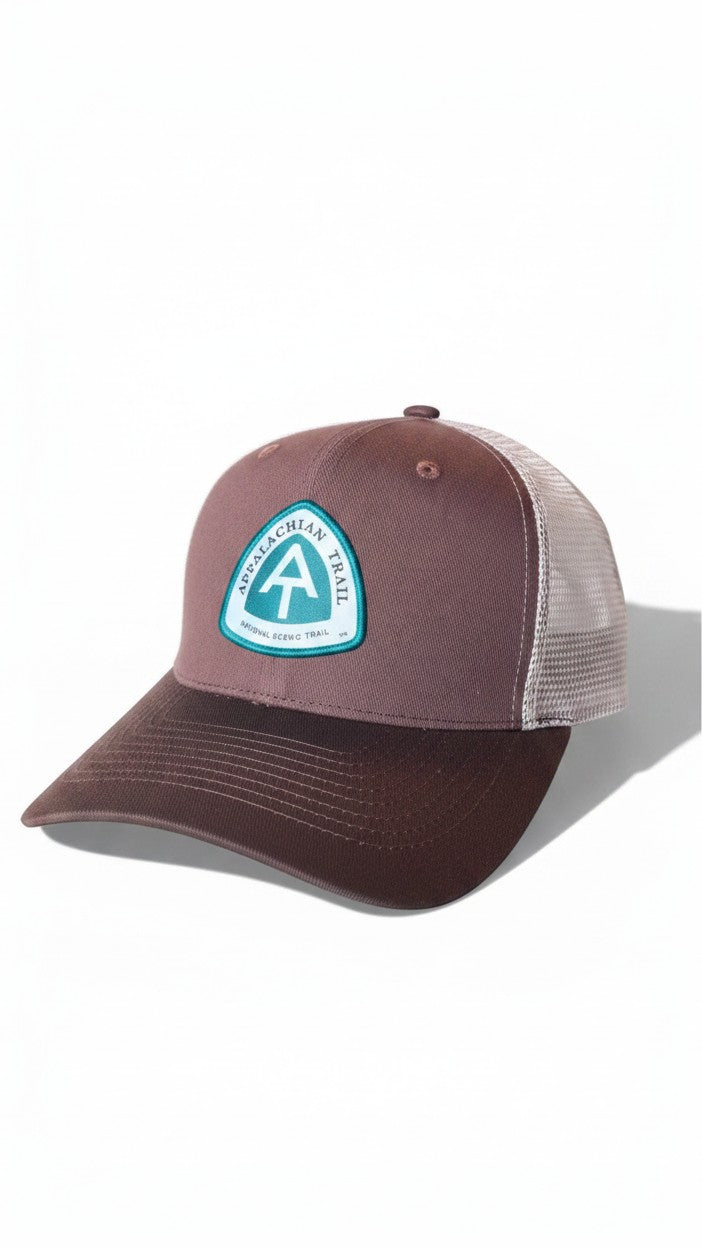 Moove Headwear brown trucker hat with Appalachian Trail logo patch, mesh back, and adjustable strap for hiking.