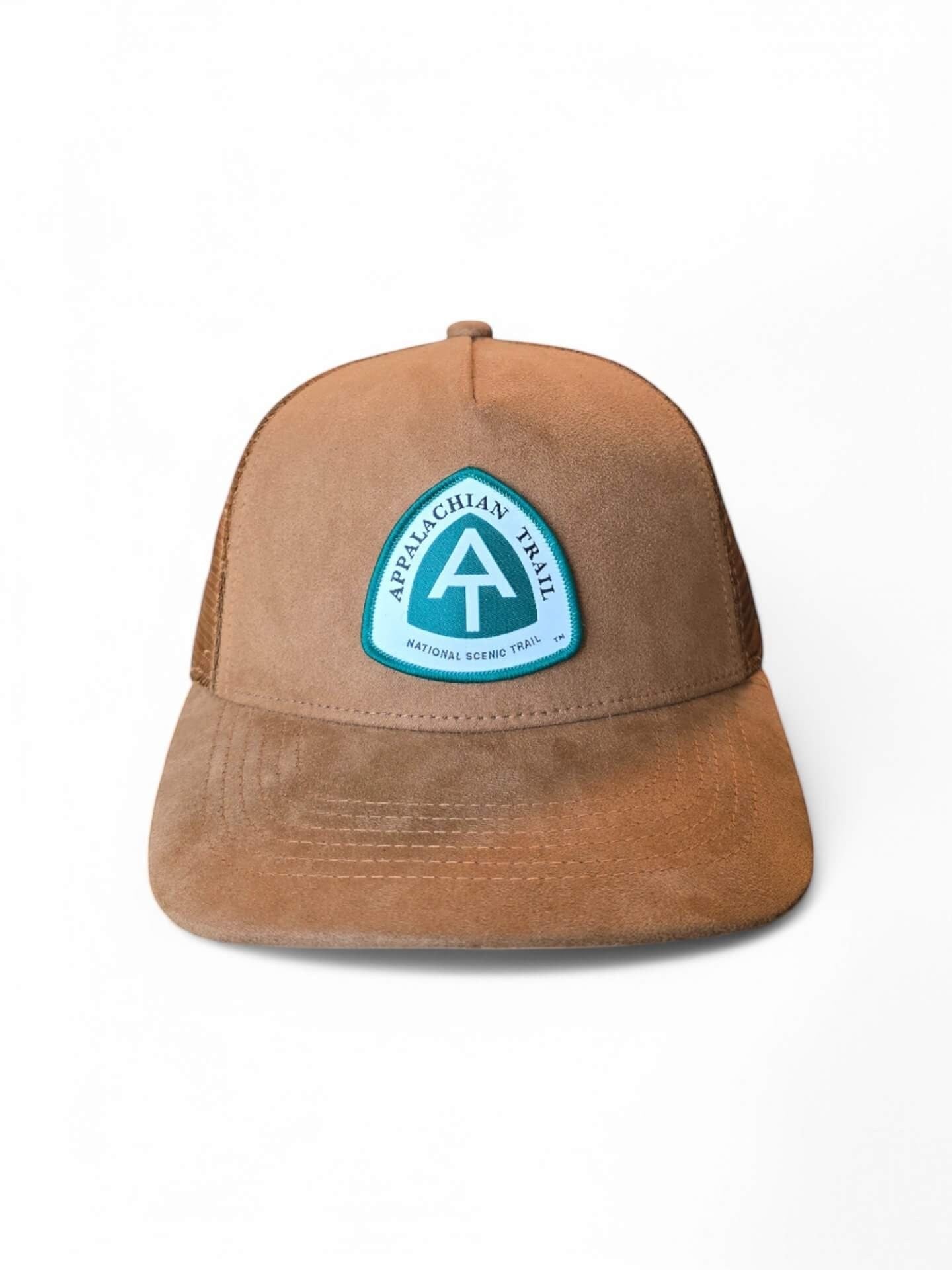 Moove Headwear tan suede trucker hat with breathable mesh back and Appalachian Trail patch. Adjustable snapback.