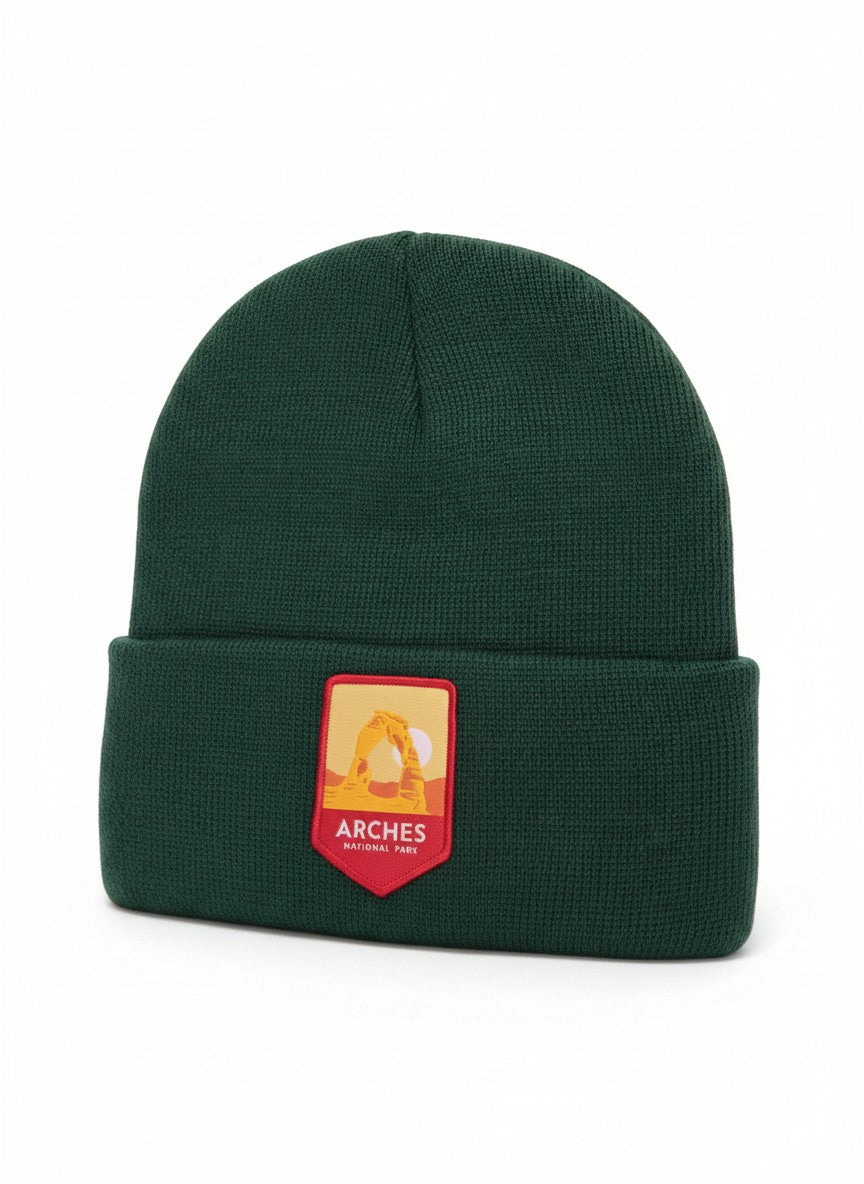 Moove Headwear dark green knit beanie with Arches National Park patch. One size fits most.