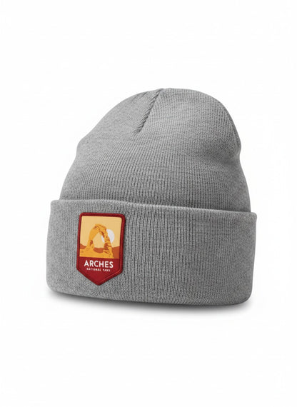 Moove Headwear grey knit beanie with Arches National Park patch, perfect for hiking and cold weather.