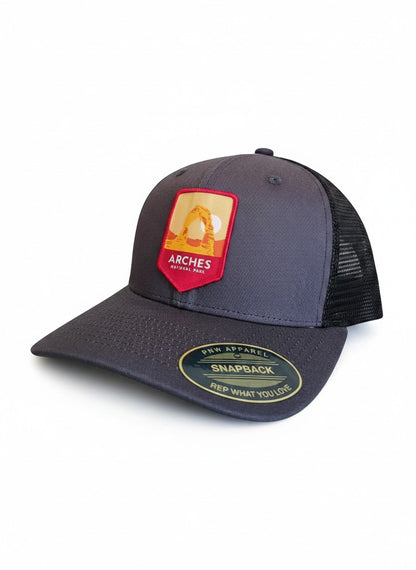 Moove Headwear Arches National Park embroidered dad hat in charcoal grey with black mesh back and adjustable strap.