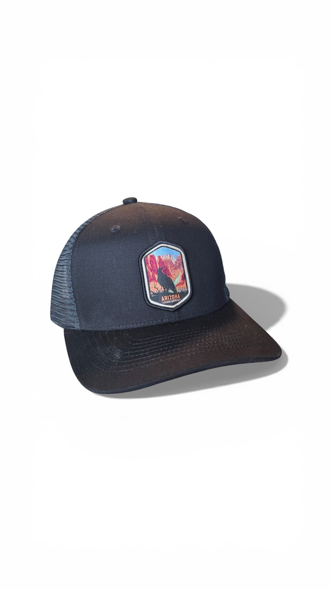Moove Headwear dark blue baseball cap with embroidered Arizona desert landscape patch and mesh back.