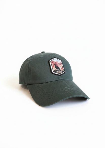 Moove Headwear dark green cotton twill baseball cap with Grand Canyon patch and adjustable hook and loop backing.
