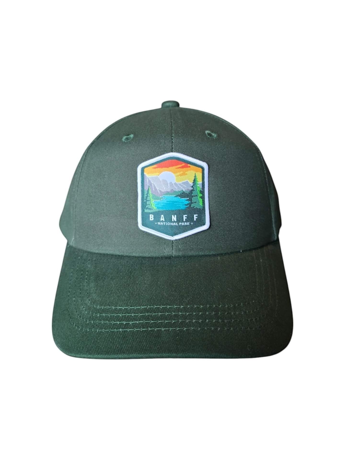 Moove Headwear dark green baseball cap with embroidered Banff National Park logo patch, adjustable strap