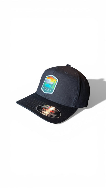 Moove Headwear black fitted cap with Banff National Park embroidered patch, flexible fit, breathable fabric.
