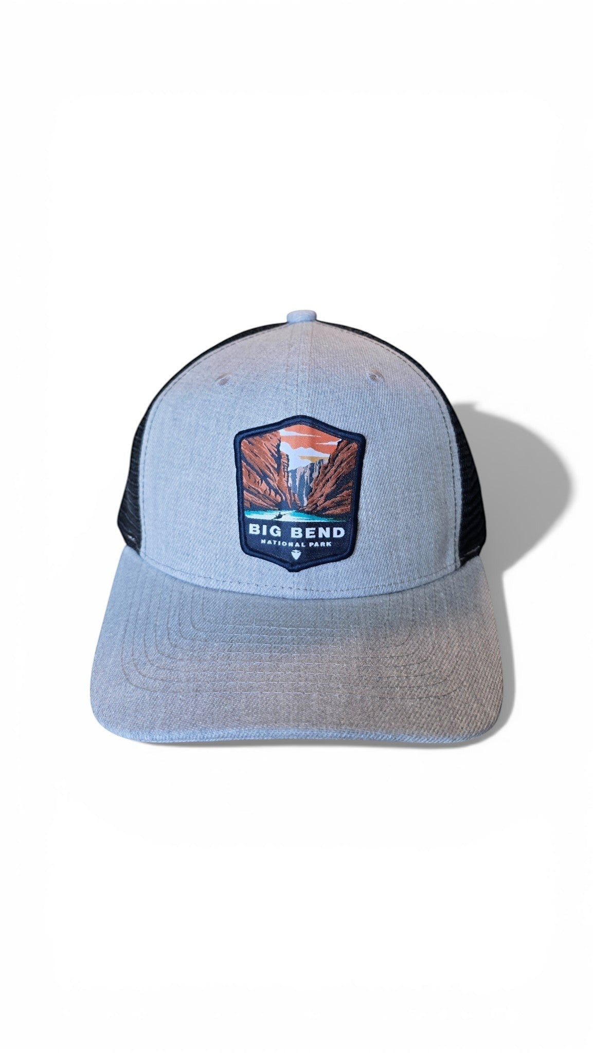 Moove Headwear Big Bend National Park trucker hat, heather grey front panels, black mesh back, adjustable snapback closure.