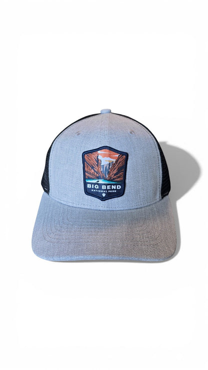 Moove Headwear Big Bend National Park trucker hat, heather grey front panels, black mesh back, adjustable snapback closure.
