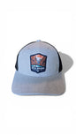 Moove Headwear Big Bend National Park trucker hat, heather grey front panels, black mesh back, adjustable snapback closure.