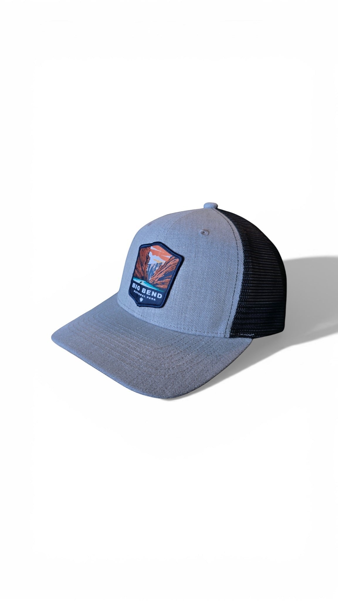 Moove Headwear Big Bend National Park trucker hat, heather grey front panels, black mesh back, adjustable snapback closure.