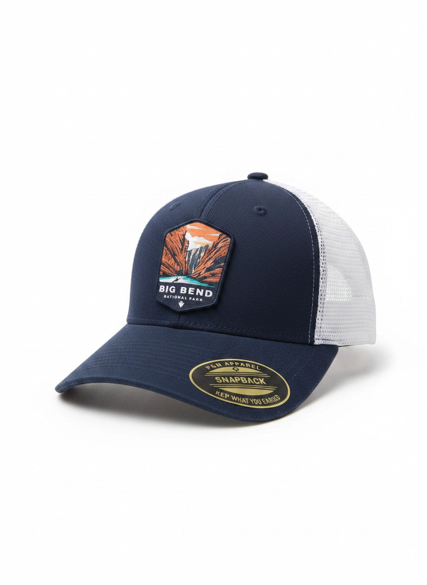 Moove Headwear Big Bend National Park trucker hat with navy front and white mesh back, featuring a woven patch.