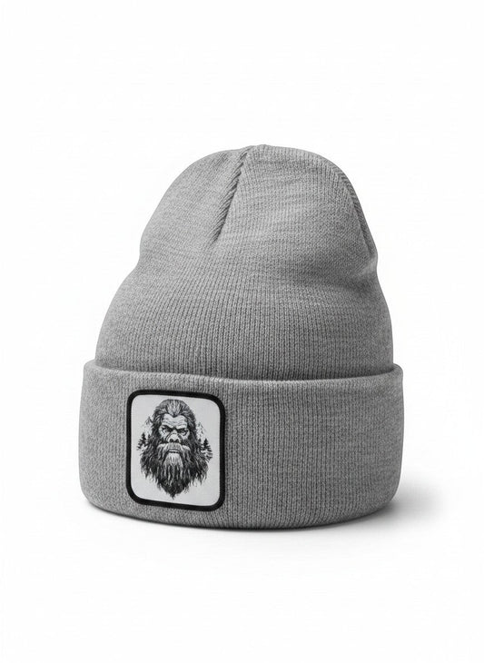 Moove Headwear grey acrylic knit beanie with a Bigfoot Sasquatch patch. One size fits all.