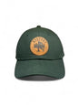 Moove Headwear dark green trucker hat with Bigfoot Sasquatch leather patch and adjustable closure.