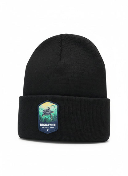 Moove Headwear black knit beanie with Biscayne National Park patch featuring a sea turtle and coral reef.