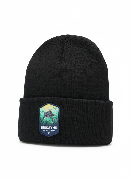 Moove Headwear black knit beanie with Biscayne National Park patch featuring a sea turtle and coral reef.