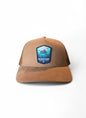Moove Headwear tan suede trucker hat with mesh back and Biscayne National Park patch featuring a sea turtle.