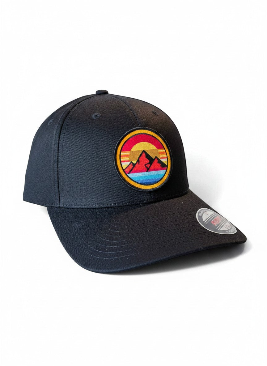 Moove Headwear black fitted hat with retro sunset mountain patch. Features embroidered design with 80s stripes.