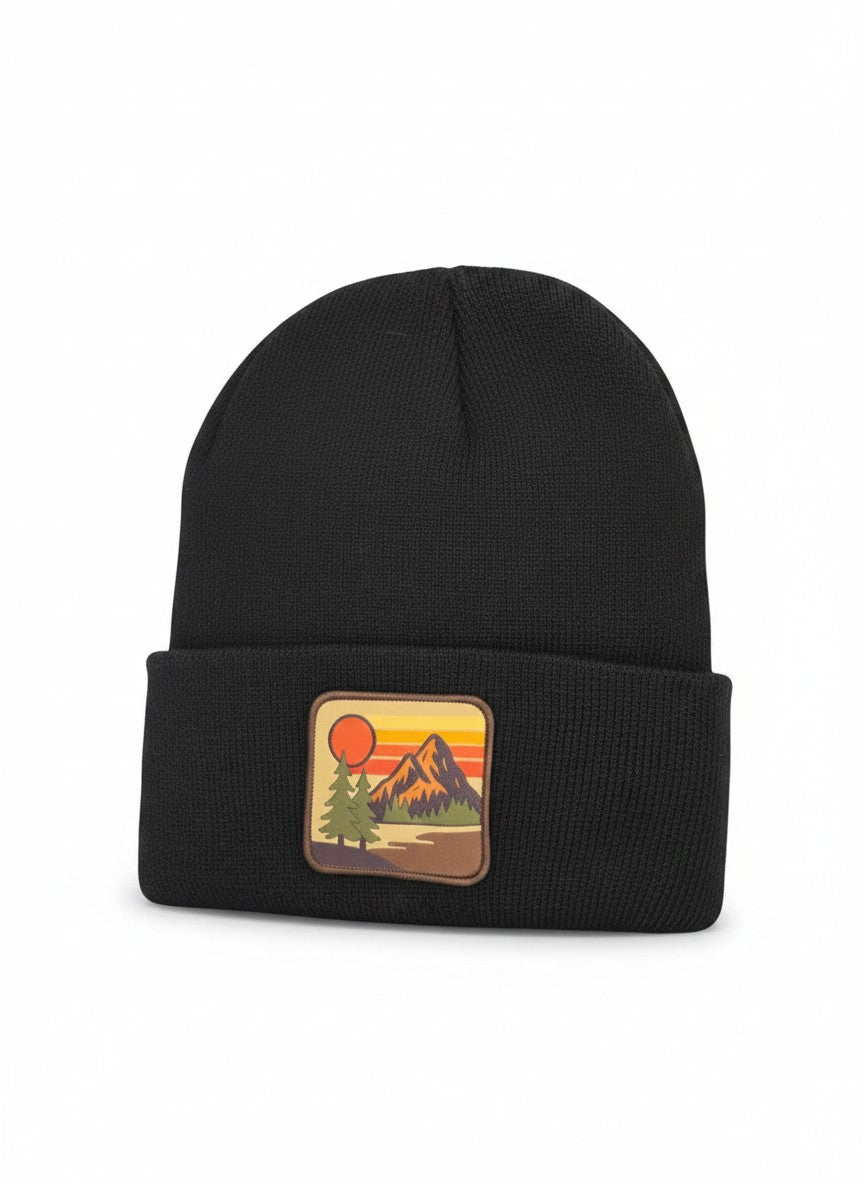 Moove Headwear black knit cuffed beanie with vintage mountain sunset patch. Unisex fit.