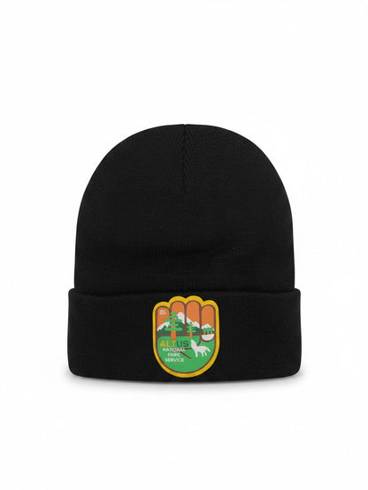 Moove Headwear black cuffed knit beanie featuring an AltUs National Park patch with a wolf and mountain landscape.