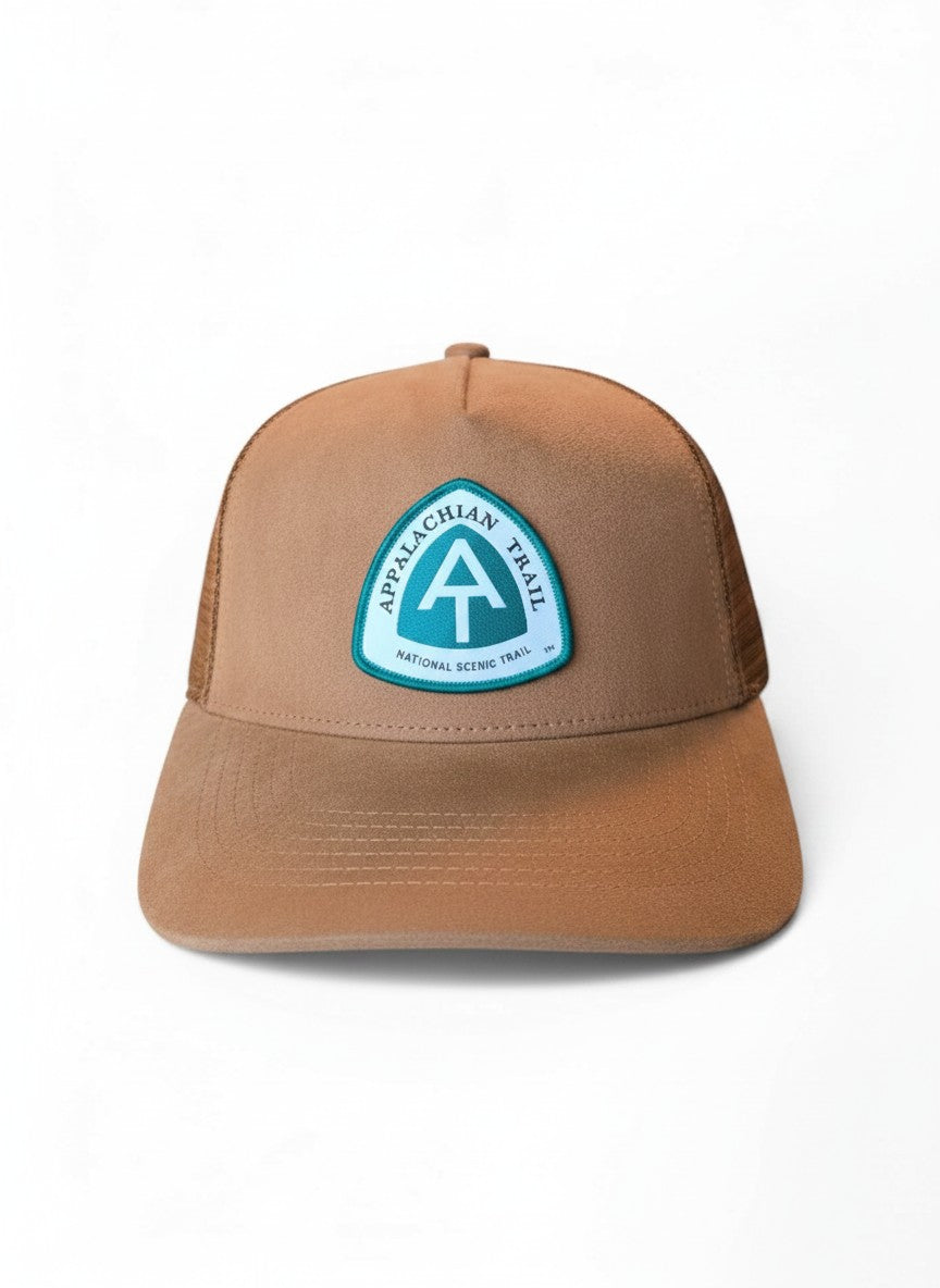 Moove Headwear brown suede trucker hat with breathable mesh back and Appalachian Trail patch.