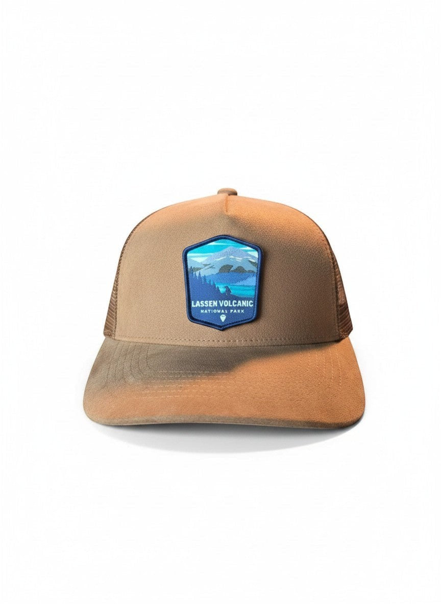 Moove Headwear brown suede trucker hat with mesh back and Lassen Volcanic National Park patch. Ideal for hiking and camping.