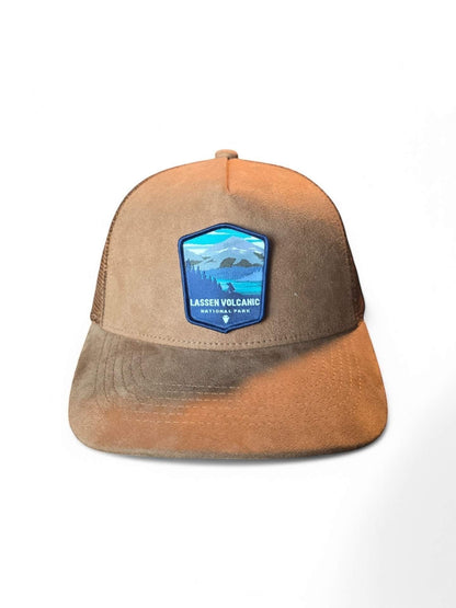 Moove Headwear brown suede trucker hat with mesh back and Lassen Volcanic National Park patch. Ideal for hiking and camping.