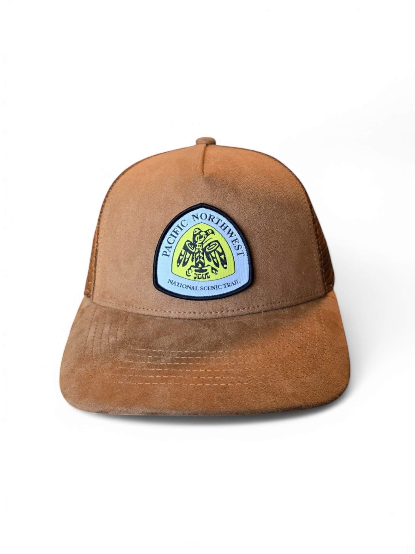 Moove Headwear brown suede mesh trucker hat with Pacific Northwest Trail patch and adjustable snapback