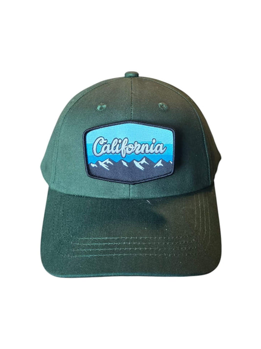 Moove Headwear dark green baseball cap with a woven patch depicting California mountains and trees. Adjustable fit.