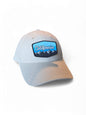Moove Headwear light grey baseball cap with a "California Mountains" embroidered patch, adjustable fit, and sun protection.