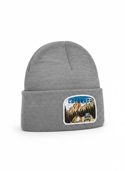 Moove Headwear grey knit beanie with Colorado mountain adventure patch, featuring a tent, jeep, and mountains.