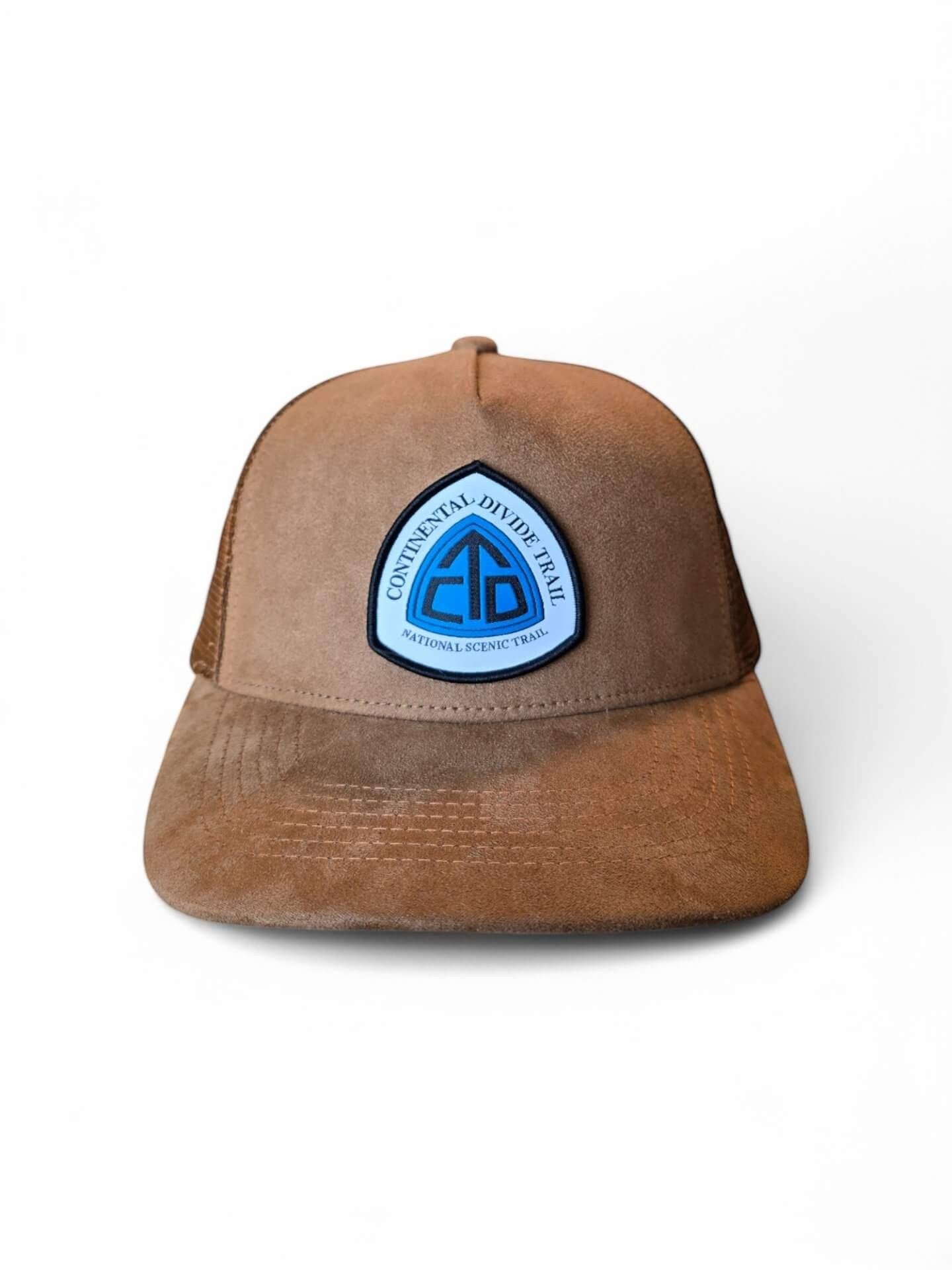 Moove Headwear brown suede trucker hat with mesh back and Continental Divide Trail patch. Adjustable snapback.