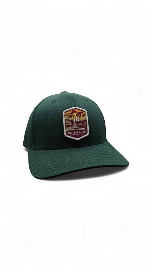 Moove Headwear dark green embroidered dad cap with Cuyahoga Valley National Park patch and curved brim.