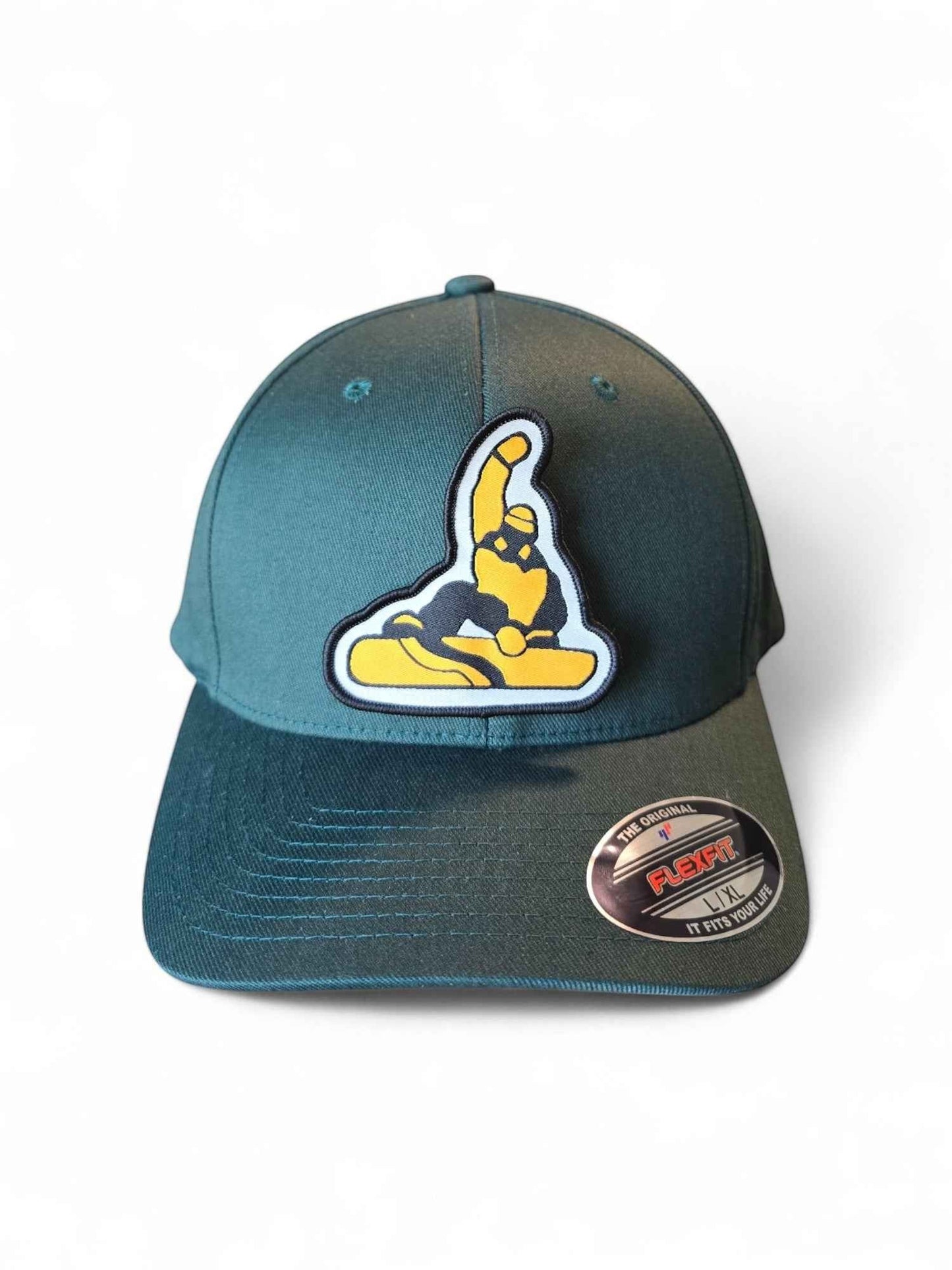 Moove Headwear dark green fitted cap with a yellow and black snowboarder patch. Features a structured crown and Flexfit logo.