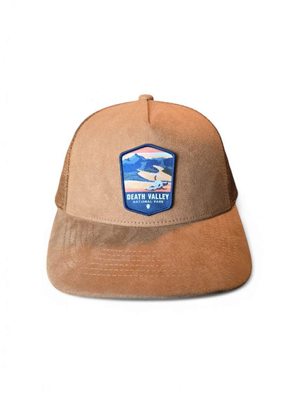 Moove Headwear Death Valley National Park suede trucker hat with mesh back and adjustable snapback closure.