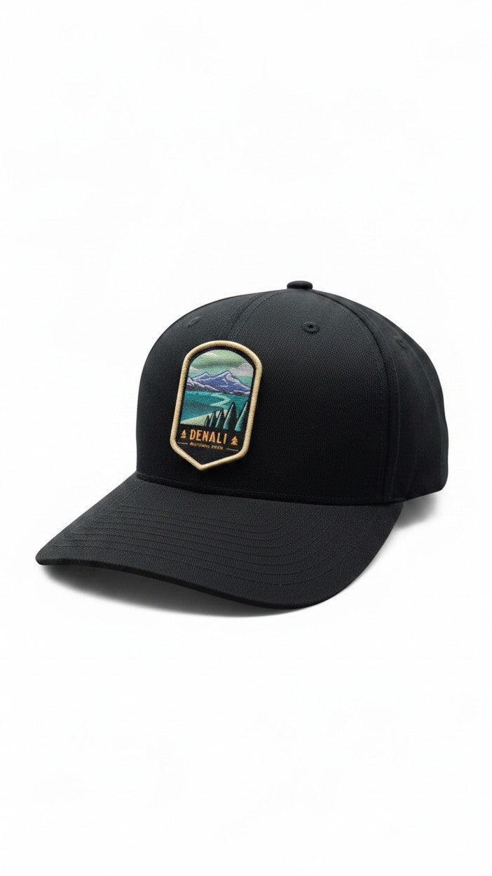 Moove Headwear black fitted baseball cap with Denali National Park embroidered patch featuring mountains, trees, and aurora.
