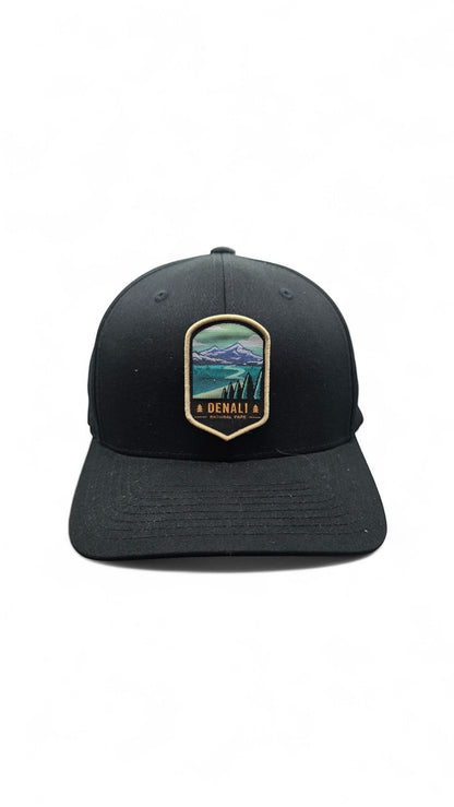 Moove Headwear black fitted baseball cap with Denali National Park embroidered patch featuring mountains, trees, and aurora borealis.