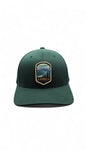 Moove Headwear green fitted baseball cap with Denali National Park embroidered patch featuring mountains and trees.