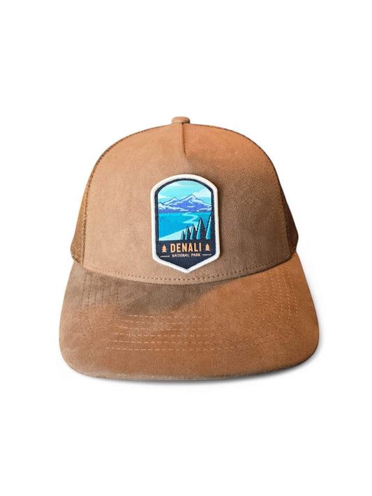Moove Headwear tan suede trucker hat with Denali National Park patch and breathable mesh back.