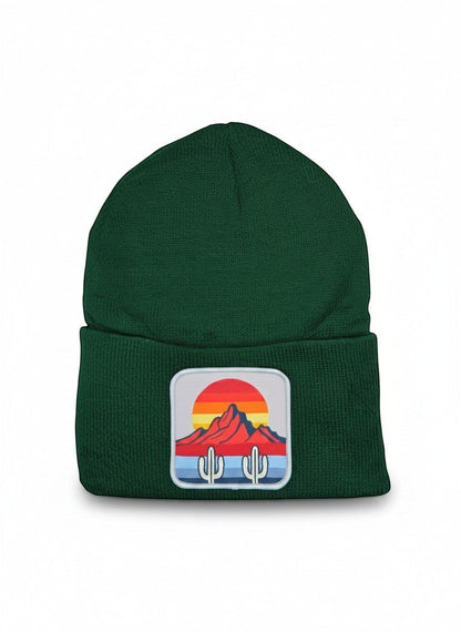 Moove Headwear dark green knit beanie with a desert sunset cactus patch. Features a ribbed cuff.